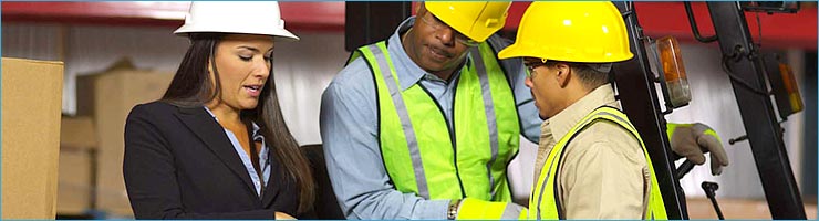 Confined space training, people with hard hats following a confined space training, davit arm, hard hats, safety, health and safety